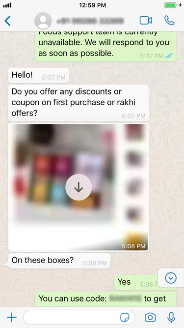 Omai Foods chatting with customers and offering discount coupons.
