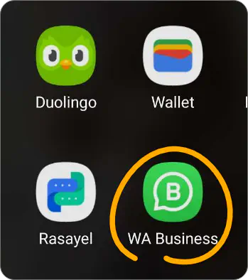 WhatsApp Business icon on a mobile phone.